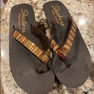 Sketchers Yoga Foam flip flops. Only worn a few times around the house.